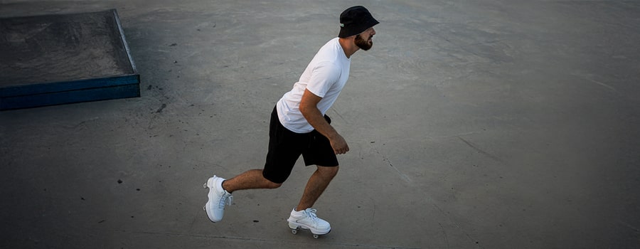 Man takes a ride in roller shoes