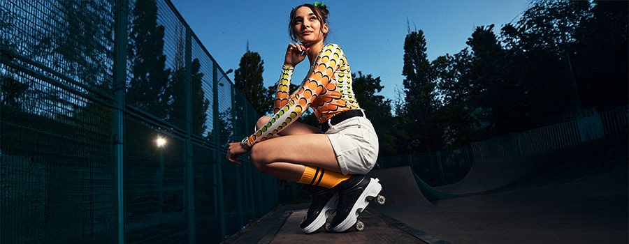 Young woman in roller shoes