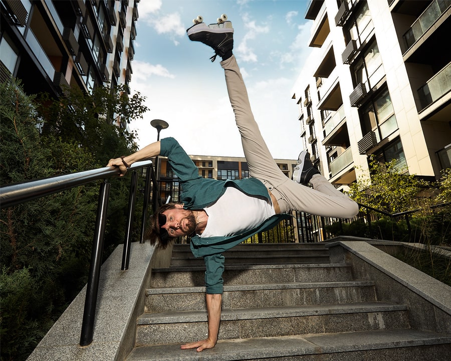 Man doing stunts in roller shoes