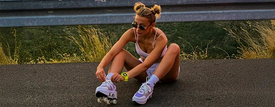 Woman sitting on road