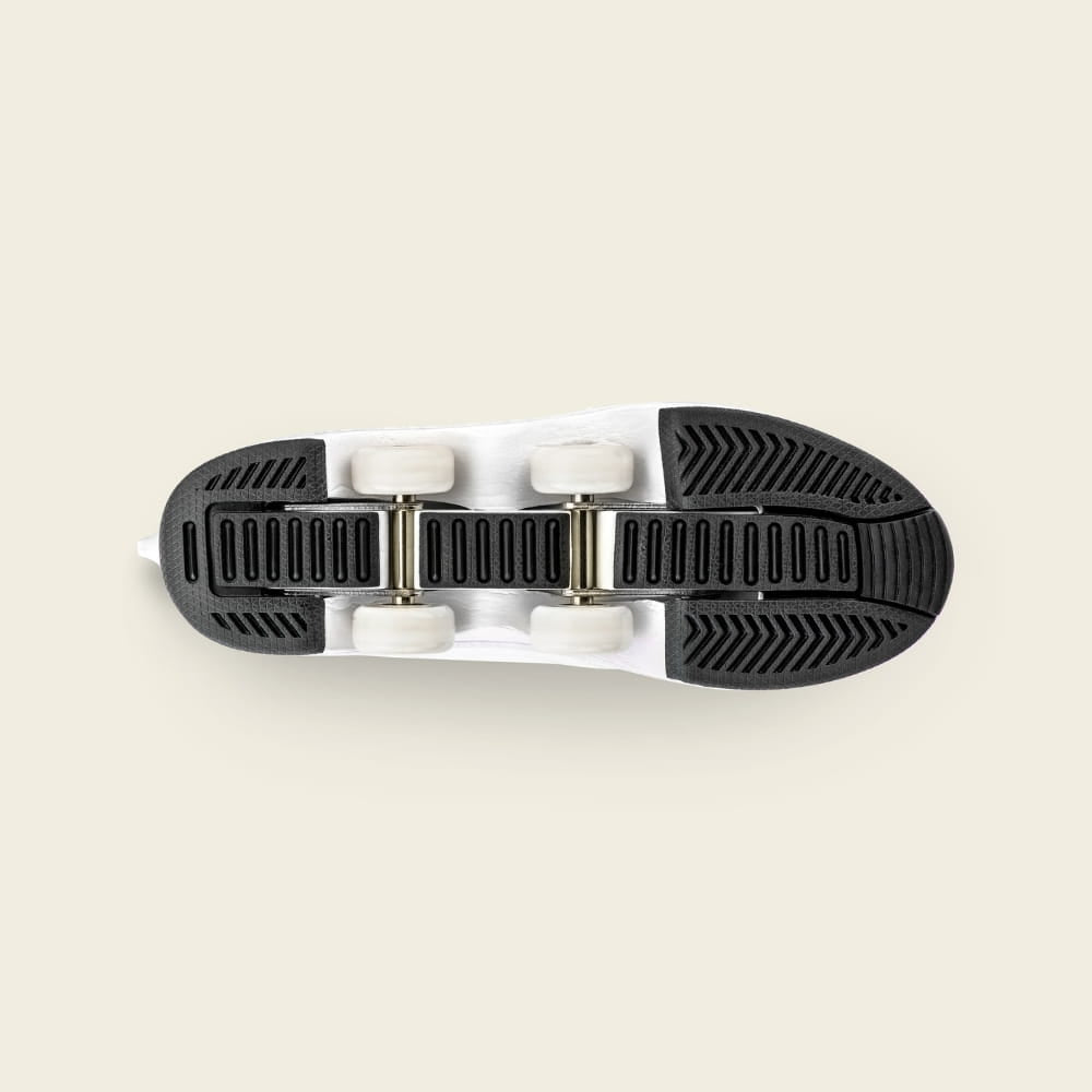 Sole and four wheels of Kids' Lumi roller shoes, stable for beginners