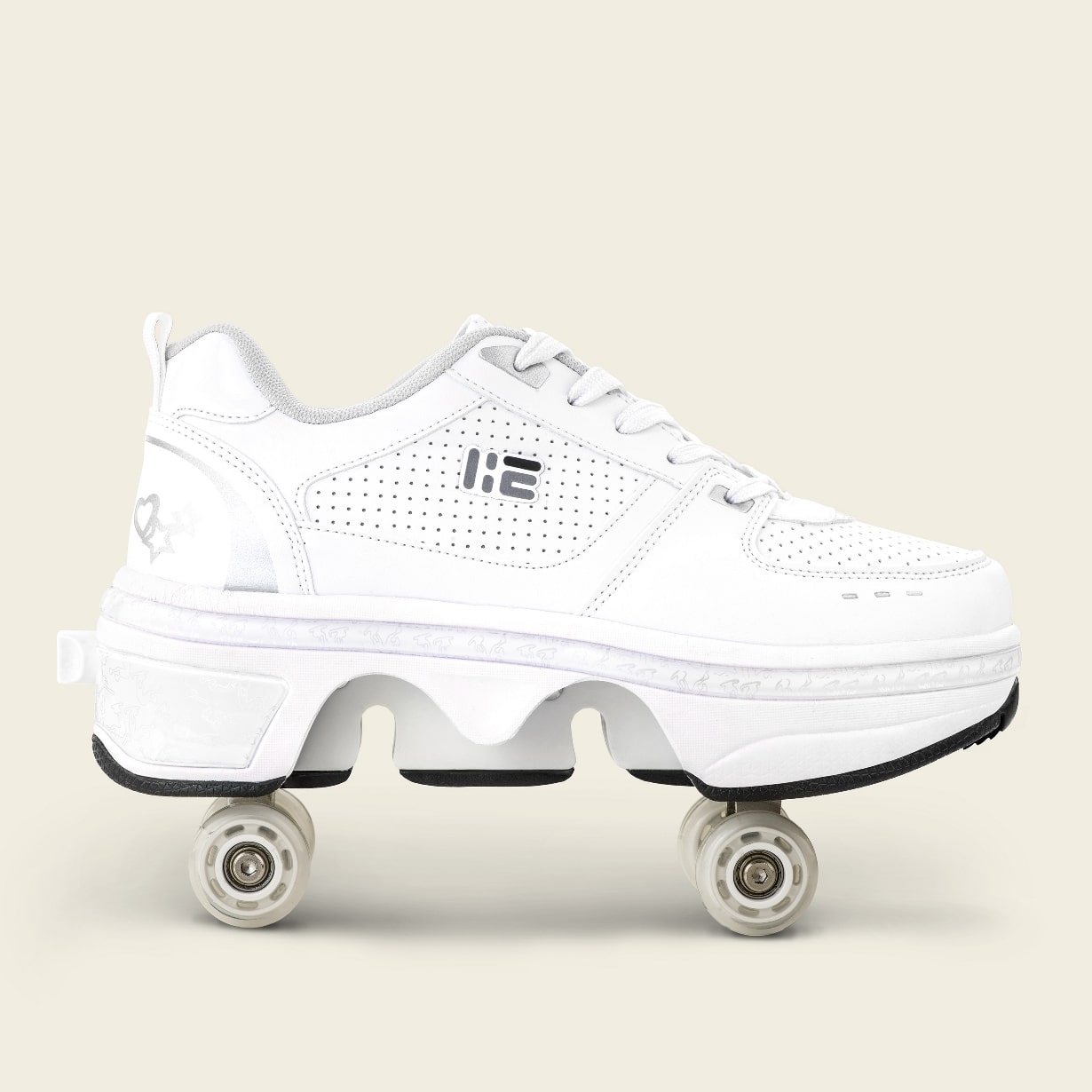 Liekick Classic White roller shoe displayed in skate mode, showing both roller wheels extended from the thick, textured white sole with a black rubber bottom. The shoe has a perforated white leather upper, a subtle star pattern on the heel, and a pull-tab at the back for easy wear.