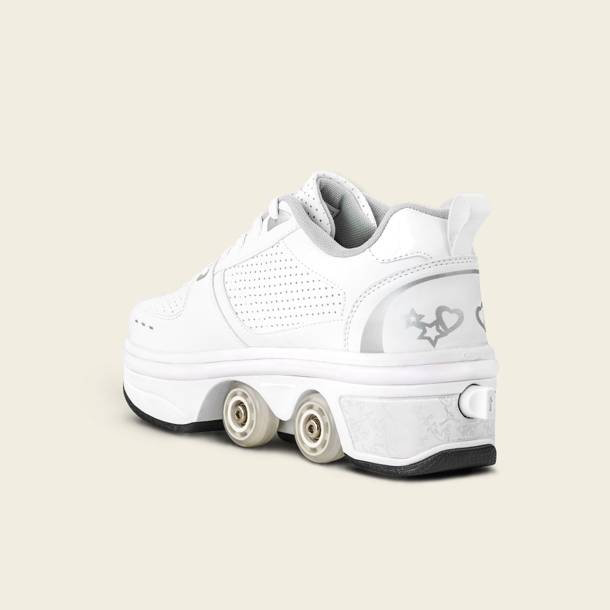 Rear angle view of Liekick Classic II White roller shoe, showing silver heart and star design on heel, white perforated upper, and retractable wheels on a cream background.
